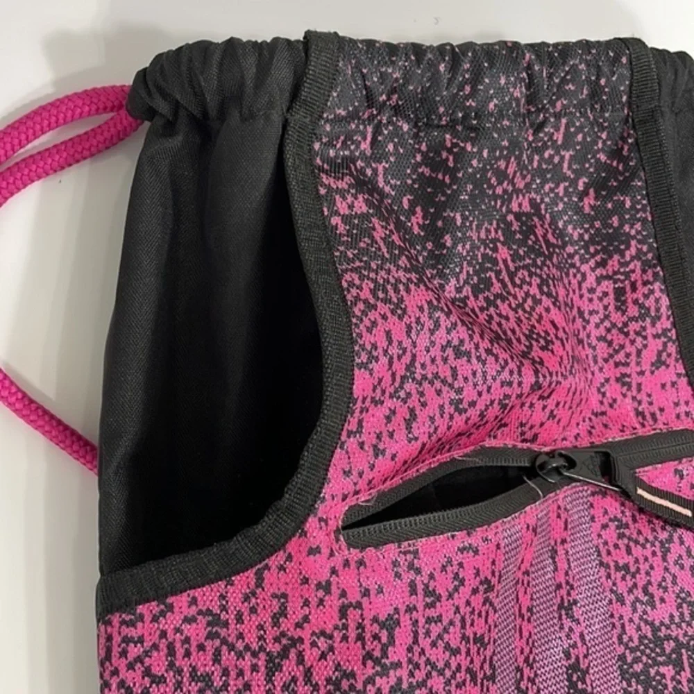 Adidas cinch backpack bag. 13.5” x 18”. Black and pink. Excellent used condition